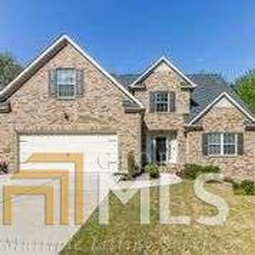 Absolutely stunning 2-story brick-front home with full basement, 5 bedrooms, 3.5 baths, conveniently located with easy access interstates,  minutes  to Braves Stadium, shopping and more.  Hardwoods on main level and upper stairs.  Large master bedroom on main w/sizeable walk-in closet, bathroom suite w/double vanity, separate tub and shower, tile flooring, bright kitchen with 42" white cabinets, granite countertops, breakfast bar,  separate breakfast area, separate dining, 4 large bedrooms upstairs, jack-n-jill bath, plus another full bath in hall!A must see, original owner has put a lot of love and care in this home!!