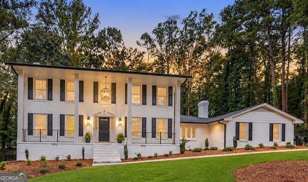 Photo of 5004 Mountclaire Road, Stone Mountain, GA 30087 (MLS # 10874500)