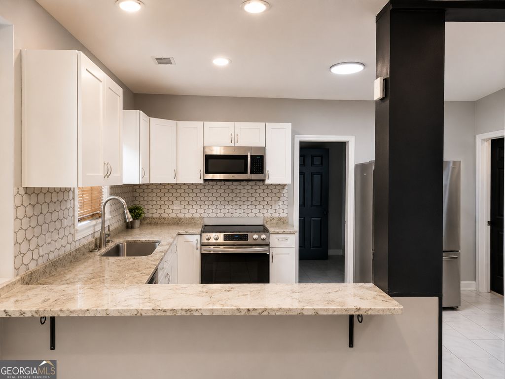 Photo of 635 Pebble Street, Macon, GA 31201 (MLS # 10766405)