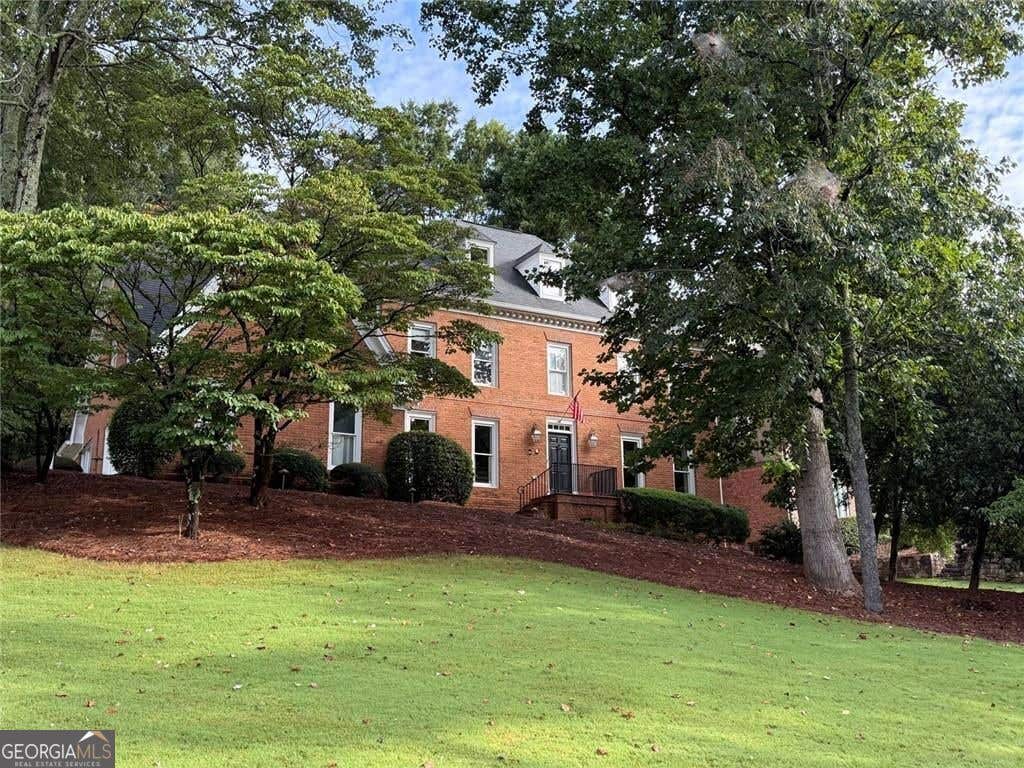 Photo of 7680 Dunvegan Close, Sandy Springs, GA 30350 (MLS # 10828062)
