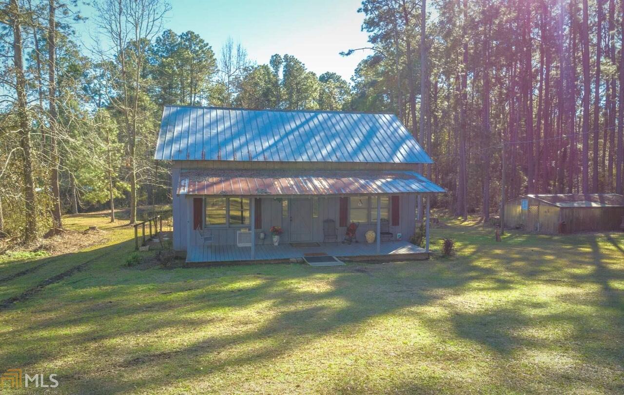 FOR SALE AT AUCTION: 1,778 Sq.Ft. beautiful two story home on 10.9 +/- acres. 3 bedroom /2 bathroom with hardwood floors. Great yard, pond, planted pines, large greenhouse, front porch, and covered back deck. Located in Colquitt County. Property is for sale at Auction. Price listed is for reference purposes only. Final price will be determined by competitive online bidding at auction ending TUESDAY, MARCH 16, 2021. GA #AU-C003060