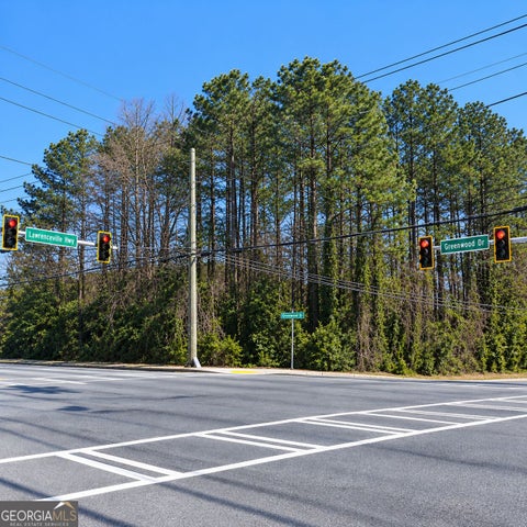 Photo of 5314 Lawrenceville Highway NW, Lilburn, GA 30047 (MLS # 10849454)
