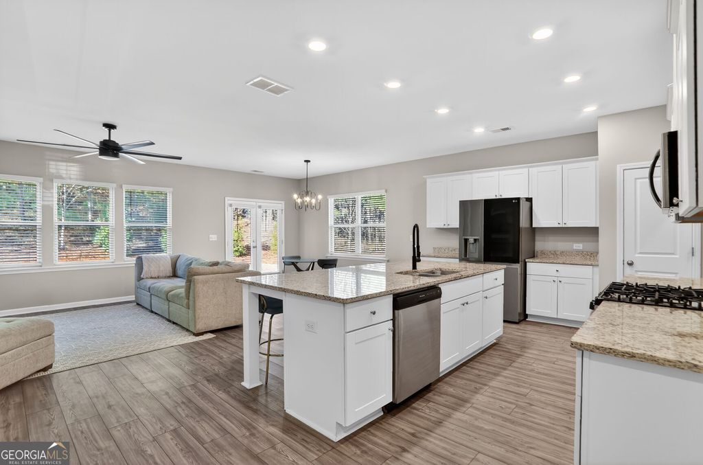 Photo of 6228 Lanier Harbor Landing, Buford, GA 30518 (MLS # 10658246)