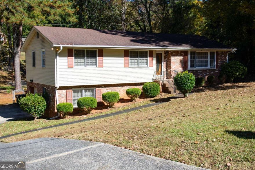 Charming 3-bedroom, 2-bathroom home located in a quiet neighborhood of East Point. This property features a spacious living area, a large backyard, and plenty of potential for customization. Perfect for investors or buyers looking for a project! Please note, this home is being sold as-is. Don't miss out on the opportunity to make this your own! Seller preferred closing attorney Lueder Larkin and Hunter