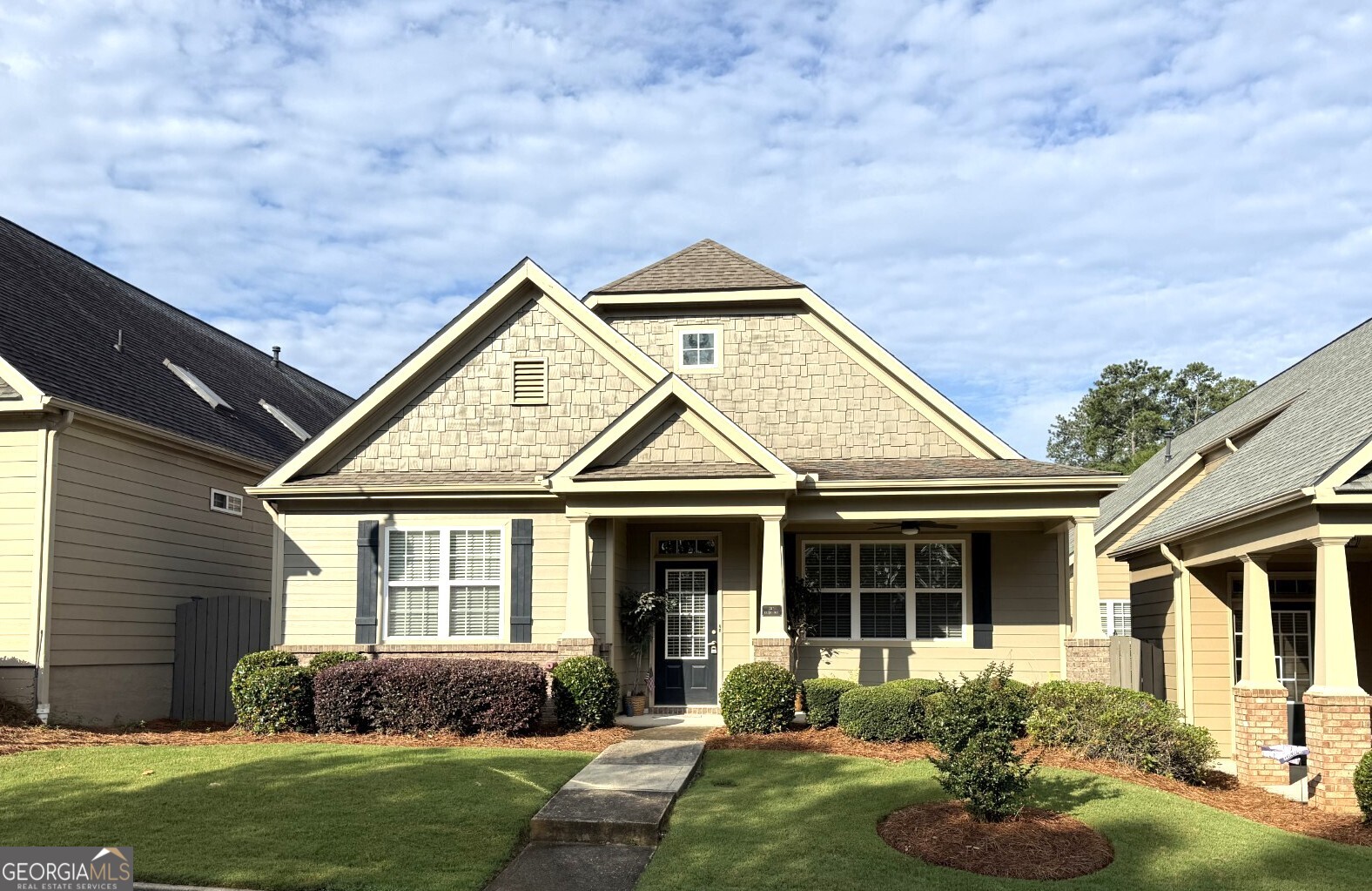 What's not to love about this great Active Adult Community? The Glens at Mountain Brook is a fantastic, gated community in a great location that is near I-575, downtown Woodstock, tons of shopping, dining and entertainment. You are also not far from all that Downtown Roswell has to offer as well! This fantastic, 1-level home features 10-foot ceilings and laminate wood flooring throughout, tons of windows and skylights in the Great Room making the home bright and cheerful. The Primary Suite features a tray ceiling with access to your private patio area, a large Primary bathroom with double vanity, and large walk-in closet with custom cabinetry. This home is move-in ready, and all appliances (including refrigerator, washer & dryer) convey at closing. The community features a Clubhouse, pool, walking trails and so much more. From the spacious kitchen you have views to the Great Room with it's gas log fireplace. This home also features a beautiful, rocking chair front porch as well as a private patio area that is great for grilling, relaxing and entertaining guests. The HOA covers exterior maintenance, including paint and roofs! Come check this home out today!