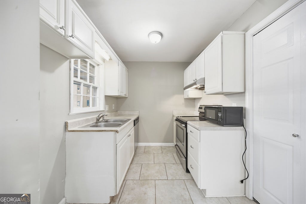 Photo of 992 Old Holcomb Bridge Road, Roswell, GA 30076 (MLS # 10874876)