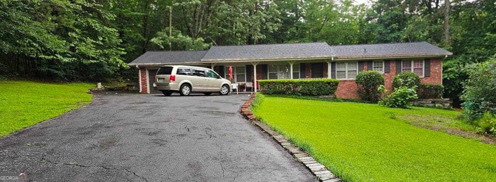 Photo of 1870 Groover Road, Marietta, GA 30062 (MLS # 10802504)