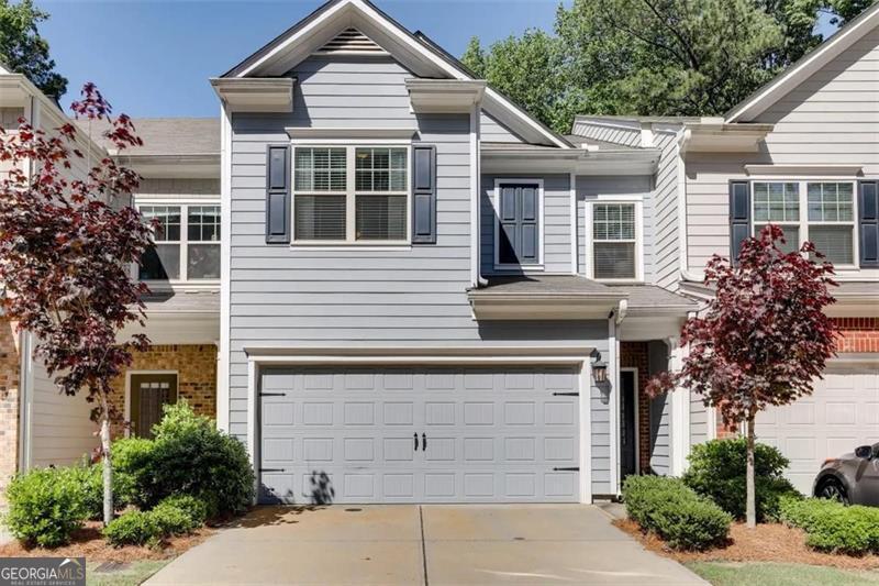 Spacious 4-bedroom, 2.5-bath townhome in a prime Doraville location offering the perfect blend of comfort and convenience. This beautifully maintained home features an open-concept floor plan with high ceilings, abundant natural light, and a bright living area ideal for entertaining. The kitchen is designed for both style and functionality, showcasing granite countertops, a premium stainless steel appliance package, ample cabinetry, and a breakfast bar for casual dining. Upstairs, the oversized primary suite creates a true retreat with a tray ceiling, walk-in closet, and a spa-inspired bath complete with dual vanities, soaking tub, and separate shower. Three additional bedrooms provide flexibility for guests, home office, or workout space. This two-car garage unit adds convenience and extra storage. Community amenities include a swimming pool and landscaped green spaces for relaxation. Located just minutes from Perimeter Mall, major highways (I-285/I-85), dining, shopping, and MARTA access, this home offers unbeatable connectivity to Buckhead, Midtown, and the airport. Experience low-maintenance living with easy access to everything Atlanta has to offer.