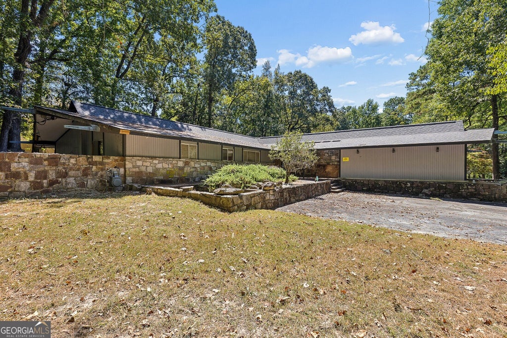 Photo of 1510 W Wesley Road NW, Atlanta, GA 30327 (MLS # 10841551)
