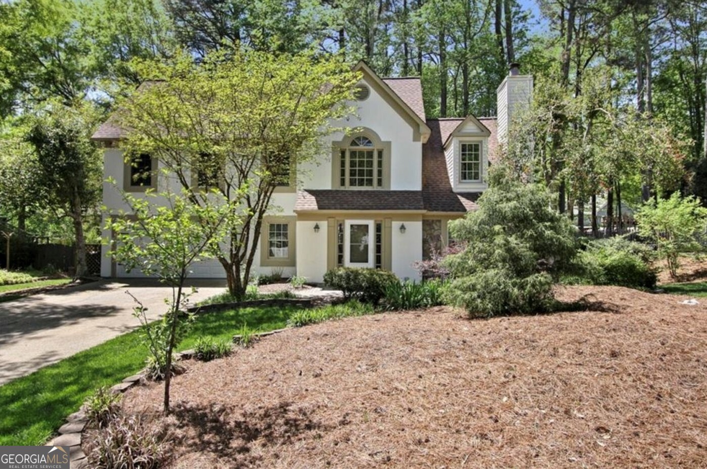 Welcome to this charming 4-bedroom home in Mannings Ridge! Nestled on a quiet cul-de-sac in the desirable Mannings Ridge swim community, this delightful 4-bedroom, 2.5-bath single-family home offers the perfect blend of comfort, space, and location. Just minutes from vibrant downtown Alpharetta, enjoy easy access to top-tier dining, boutique shopping, and year-round events. Step inside to discover new flooring throughout the main level and gleaming hardwoods upstairs. The spacious, light-filled family room features soaring vaulted ceilings that create an airy and welcoming atmosphere. A cozy sunroom thoughtfully updated with new floors, windows, and its own AC invites year-round enjoyment, whether used as a reading nook, office, or playroom. The light and bright eat-in kitchen is equipped with stainless steel appliances and ample space for casual dining. Upstairs, the generous master suite features trey ceilings and an updated en-suite bathroom, providing a relaxing retreat. Three additional bedrooms offer plenty of flexibility for guests, home office, or family needs. Located in a well-maintained community with swim amenities, this home delivers both lifestyle and location. Don't miss this exceptional opportunity to live just around the corner from all that downtown Alpharetta has to offer!