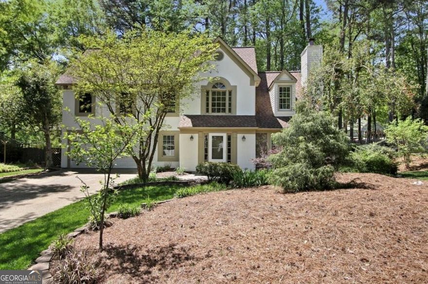 Welcome to this charming 4-bedroom home in Mannings Ridge! Nestled on a quiet cul-de-sac in the desirable Mannings Ridge swim community, this delightful 4-bedroom, 2.5-bath single-family home offers the perfect blend of comfort, space, and location. Just minutes from vibrant downtown Alpharetta, enjoy easy access to top-tier dining, boutique shopping, and year-round events. Step inside to discover new flooring throughout the main level and gleaming hardwoods upstairs. The spacious, light-filled family room features soaring vaulted ceilings that create an airy and welcoming atmosphere. A cozy sunroom thoughtfully updated with new floors, windows, and its own AC invites year-round enjoyment, whether used as a reading nook, office, or playroom. The light and bright eat-in kitchen is equipped with stainless steel appliances and ample space for casual dining. Upstairs, the generous master suite features trey ceilings and an updated en-suite bathroom, providing a relaxing retreat. Three additional bedrooms offer plenty of flexibility for guests, home office, or family needs. Located in a well-maintained community with swim amenities, this home delivers both lifestyle and location. Don't miss this exceptional opportunity to live just around the corner from all that downtown Alpharetta has to offer!