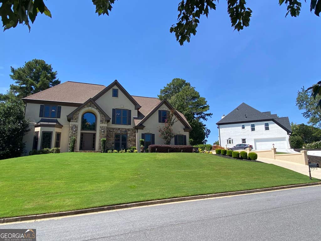 Photo of 10295 Groomsbridge Road, Johns Creek, GA 30022 (MLS # 10829178)