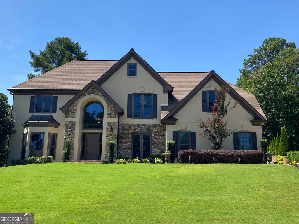Photo of 10295 Groomsbridge Road, Johns Creek, GA 30022 (MLS # 10829178)