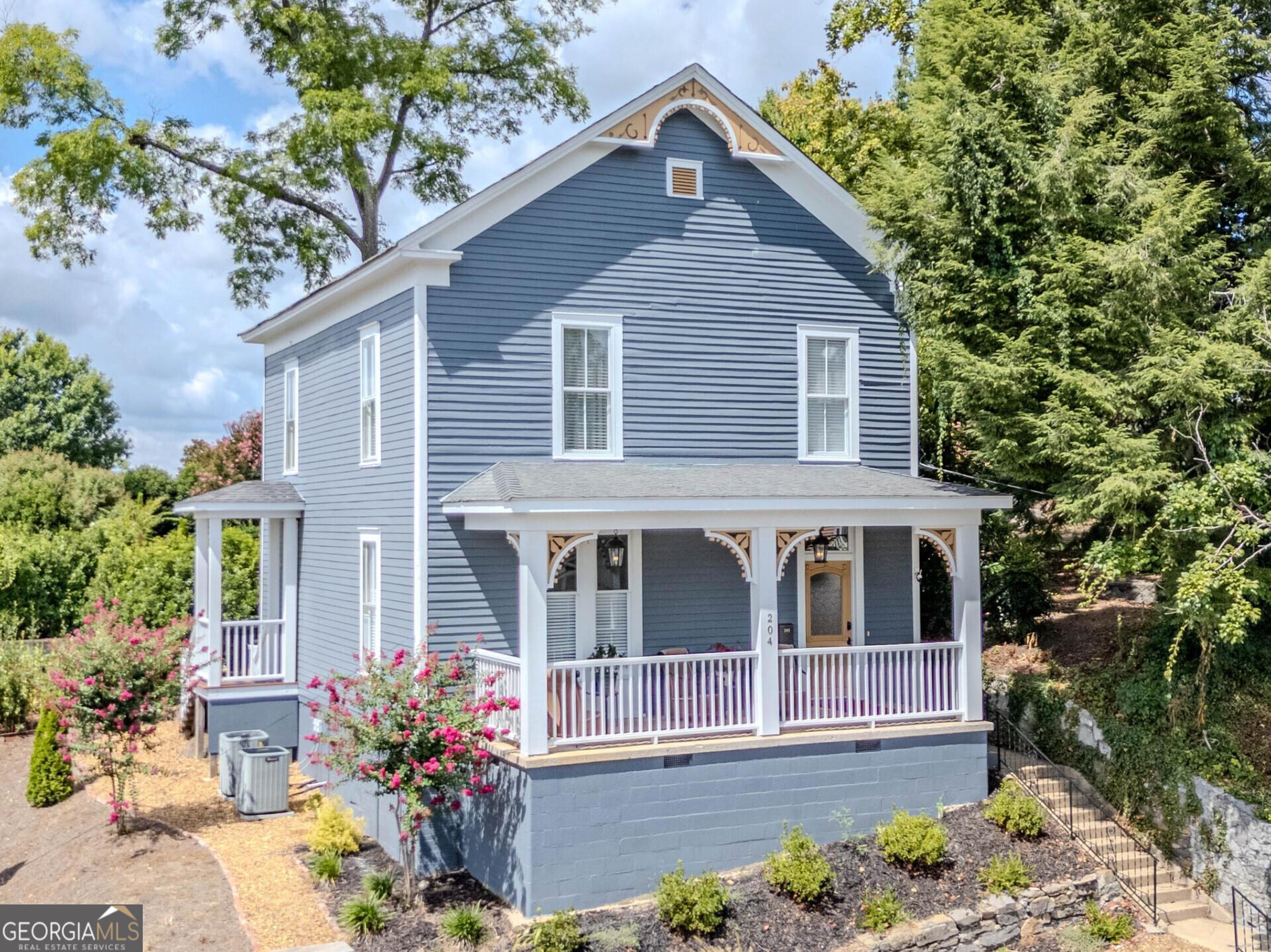 Charming Between the Rivers 2 story overlooking the clocktower!!! This home has been lovingly restored from top to bottom! From the beautiful rocking chair front porch to the private path to the grounds of the clocktower! Come see the attention to detail that was given while returning this early 1900s Craftsman to its former glory. Spacious living, dining, kitchen and guest bath on the main level and master bedroom with private bath, guest room and spare bathroom plus the laundry on the second floor. The kitchen boasts stained heart-pine tongue and groove cabinets with custom pull outs for spices, lazy-Susans, and soft-close drawers and doors! From the restored archways to the beautiful heart-pine floors top to bottom it's beautiful!! This cozy home will not last long!!