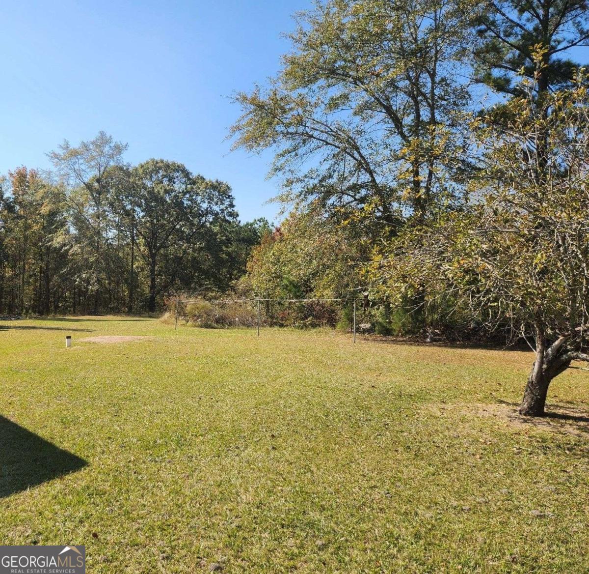 This is a Rare Opportunity to buy 60 acres 100 miles east of Atlanta. Nestled just 10 miles from the vibrant and historic downtown of Milledgeville, 184 Young Road offers a serene escape with endless possibilities. The peace and quiet is so intense you can feel it. This expansive, 60-acre property boasts level, partially cleared land, making it ideal for a variety of uses, whether you envision a recreational retreat, a productive agricultural venture, or the site of your dream home. Once a thriving working farm, the land now offers a blank canvas for your vision. Its tranquil setting combines natural beauty with the convenience of proximity to Milledgeville, a city rich in history and charm. As Georgia's former state capital, Milledgeville is steeped in Southern heritage and home to Georgia College and State University. The picturesque downtown area is alive with an array of restaurants, unique shops, and historical landmarks that attract visitors and residents alike. Whether you're seeking a peaceful rural lifestyle or a versatile investment, 184 Young Road is a rare gem offering both potential and proximity to a community with deep roots and modern appeal. Don't miss this chance to own a piece of Georgia's heartland. Priced to sell "As Is", this is an estate sale. Probate has been completed. The property is currently has conservation status.