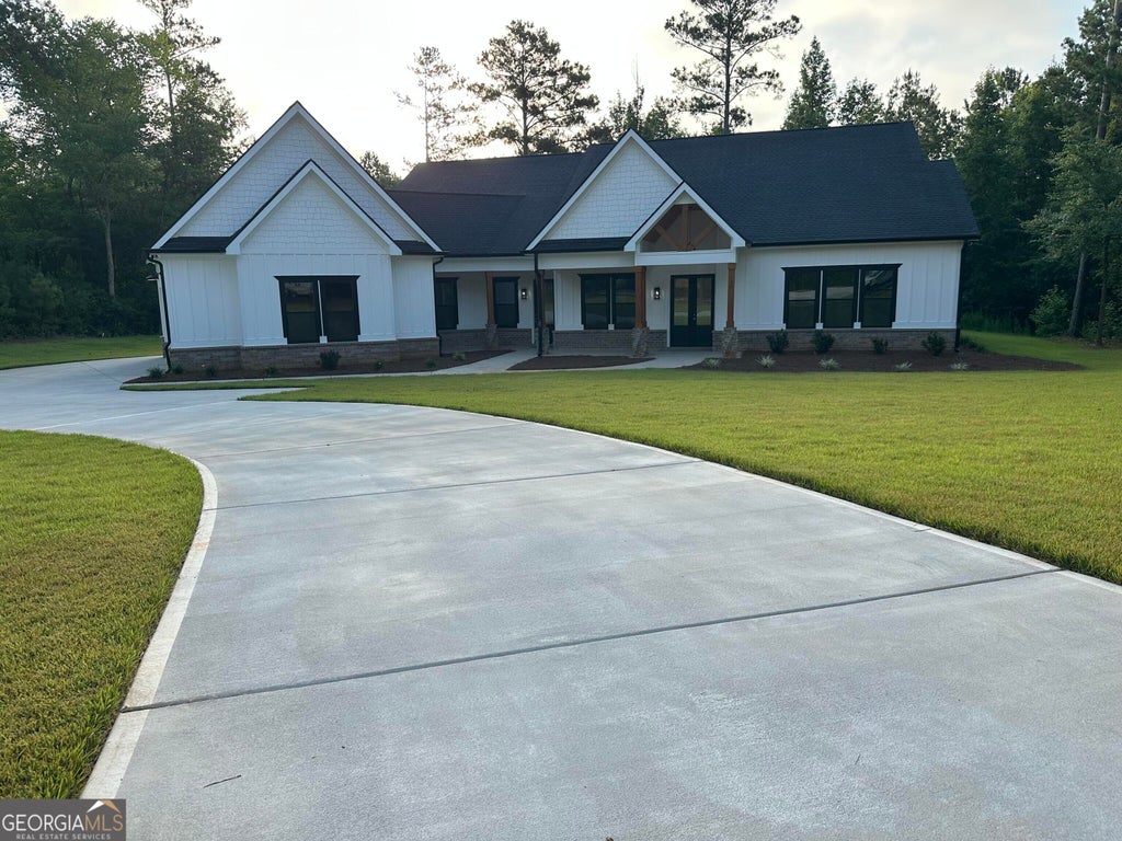 Photo of 153 Dub Walker Road, Jackson, GA 30233 (MLS # 10878629)