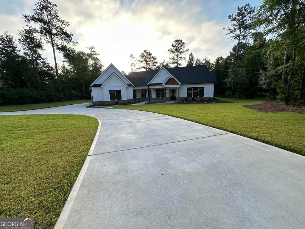Photo of 153 Dub Walker Road, Jackson, GA 30233 (MLS # 10878629)