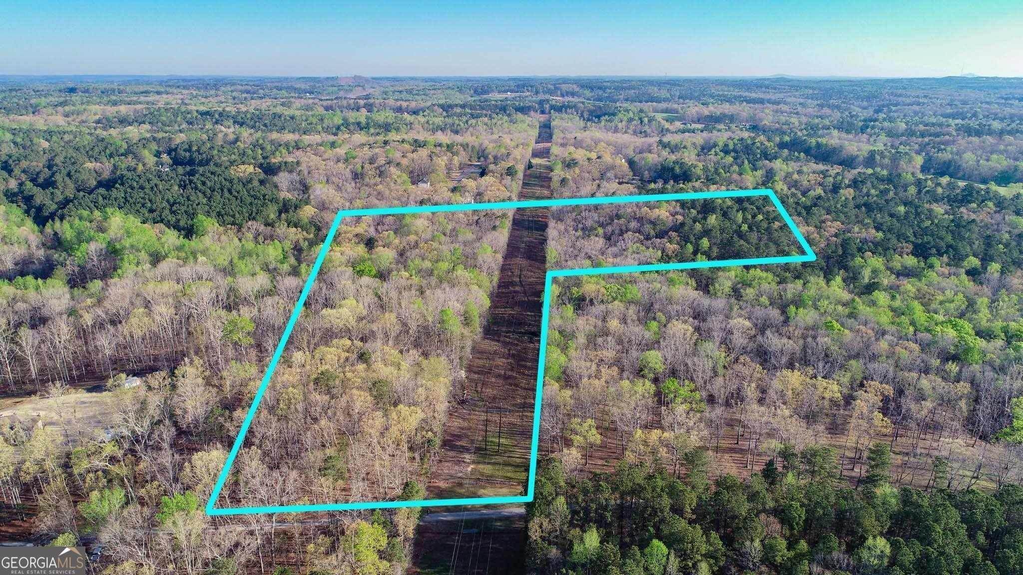 This would be a great home place or a hunting property close to home. Nice hardwoods cover most of the property with a few pine mixed in. There is a nice creek in the low lying portion of the property. Has a very nice hardwood stand in that bottom. Abundant wildlife including many species of small game, deer, and turkey. This property is in the Alexander school district and is conveniently located near interstate 20 near Post Road. If you would like more information or would like to schedule a private viewing please contact Cal Hardie at 770-296-2163.