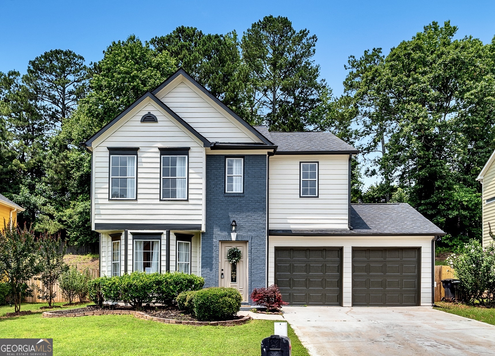 Move-In Ready Home with Stylish Updates - Prime Marietta Location! Welcome to 1075 Litchfield Way SW, a beautifully updated 3-bedroom, 2.5-bath traditional home located in a quiet, established neighborhood in Marietta. This refreshed property offers the perfect blend of modern comfort and everyday functionality, with convenient access to shopping, dining, and major highways. Inside, enjoy a sunlit living room with gas fireplace, a formal dining room, and an eat-in kitchen featuring quartz countertops, stained cabinets, pantry space, and brand-new stainless-steel appliances. Upstairs, the oversized primary suite includes a tray ceiling, walk-in closet, double vanity, and a private bath with a separate shower and soaking tub. Two additional bedrooms, a full bath, and an upstairs laundry room complete the smart layout. Step outside to a private fenced backyard with patio, ideal for relaxing or hosting weekend gatherings. Recent upgrades include brand-new interior and exterior paint, new luxury flooring throughout, new water heater, updated light fixtures, double-pane windows, and new garage doors. Enjoy the nearby Silver Comet Trail and Heritage Park, perfect for outdoor enthusiasts and weekend adventures. This move-in-ready home offers excellent value in a growing area of Cobb County-schedule your private showing today and discover all it has to offer!
