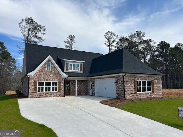 New Construction: Conveniently located in gated Community of Camden North phase 2. All Brick and Hardy construction for low maintenance. This home features 5 bedrooms with 4 full bathrooms, with the Master bedroom and one other guest bedroom on the main level. Open Floorplan with Chef's kitchen with custom cabinets, quartz countertops, KitchenAid Stainless steel appliances with gas cooktop, wall oven and pot filler! Many upgraded features such as wide hardwood flooring in all the main living areas, deluxe trim package throughout, his and hers custom master closets, large, tiled master shower with separate soaker tub are just some of the extra features you will find in this home. Enjoy the private, partially fenced back yard under the shade of the huge, covered porch. Home is now complete and ready.