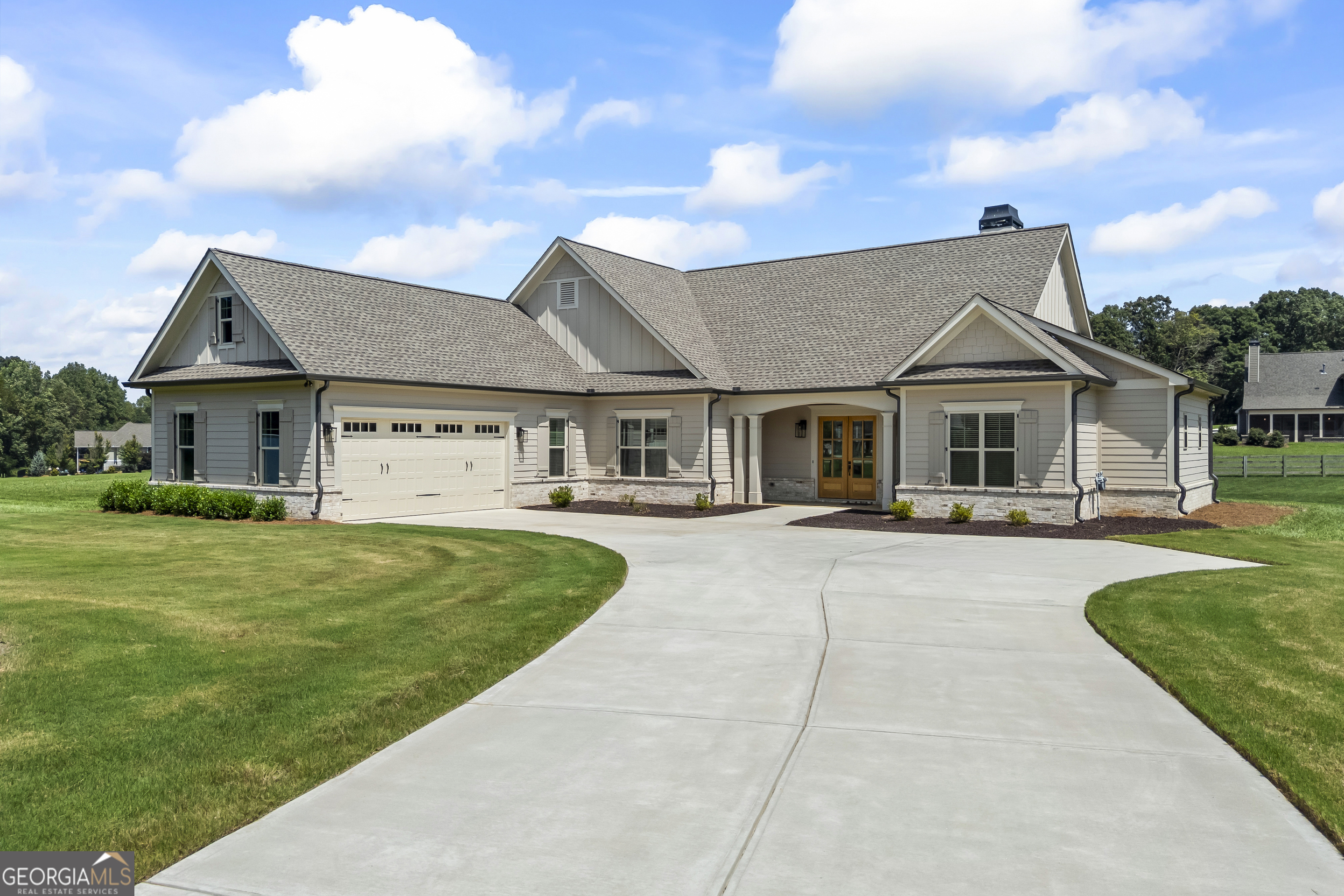 Step into luxury and comfort in this practically new custom ranch home located in one of the most desired and sought after subdivisions in Habersham county! This home sits on over an acre of flat land with no obstructions allowing for 360 degrees worth of mountain and pasture views. As you enter the home, you'll notice an open floor plan accompanied with 10' ceilings and 8' tall doors making this home open and airy. Quartz countertops, upgraded matte black finishes, and fully tiled bathrooms are just a few of the luxurious features that flow throughout the entire home. With fully finished walk-in closets and custom shelving, there is no shortage of space. The primary bedroom features his and hers closets and tall windows allowing for plenty of natural light. The primary bathroom contains a walk-in shower with an oversized soaking tub. The underground irrigation system makes yard maintenance a breeze. Opportunities in this community are rare, so don't let this piece of prime real estate slip away! The seller of this home is a licensed real estate agent.