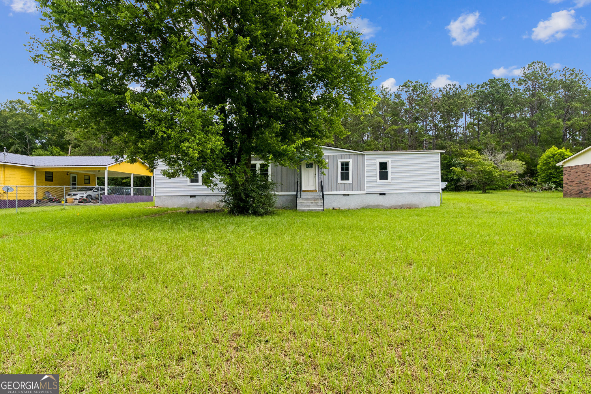 This beautifully renovated 3-bedroom, 2-bathroom home has the perfect blend of modern updates and classic Southern charm. From the moment you walk in, you'll love the open layout, fresh finishes, and thoughtful design throughout. The spacious living area flows into a brand-new kitchen featuring appliances, updated cabinetry, and durable countertops - ideal for everyday living or entertaining guests. Both bathrooms have been fully updated with modern fixtures, tile, and vanities. New flooring and paint throughout. Nice size bedrooms with ample closet space. Laundry area for added convenience. Easy access to local schools, shopping, and Hwy 18. Whether you're a first-time buyer, looking to downsize, or simply want a turnkey home, this property has everything you need. Don't wait - homes like this don't stay on the market for long. Schedule your showing today via Showingtime!