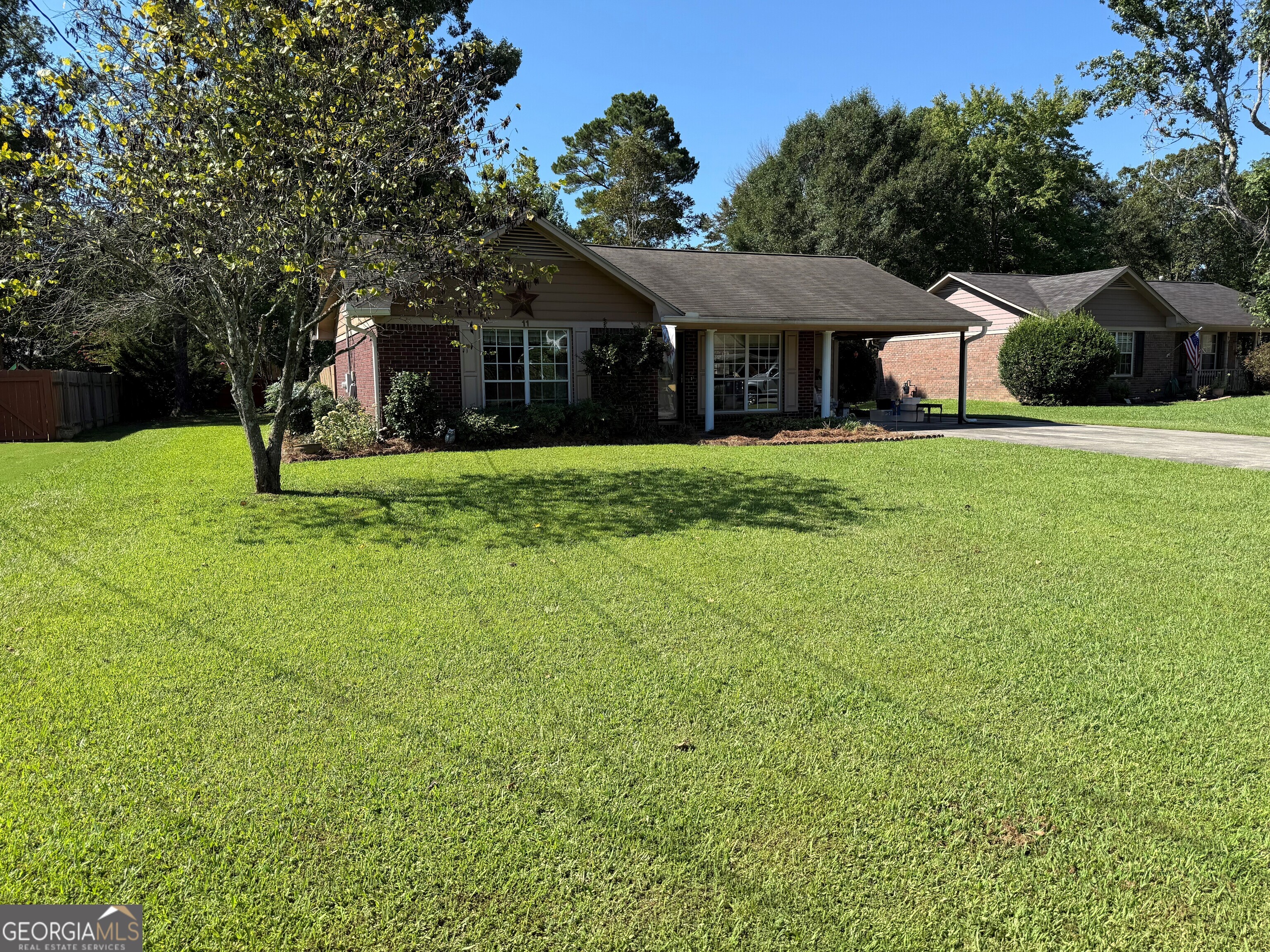 This is a very nice brick home with 2 bedrooms and 2 bathrooms, living room, kitchen w/ dining area, laundry closet, carport and patio.This home has a very nice front yard and back yard with storage building. Washer and dryer stay as well as refrigerator, range and dishwasher.
