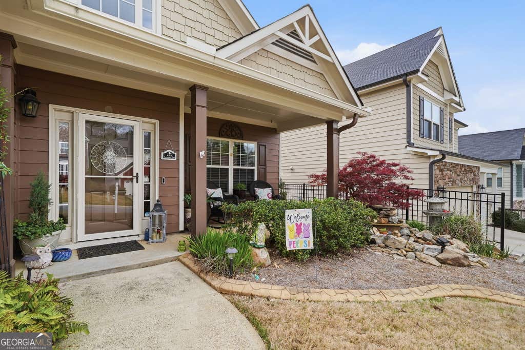 Photo of 423 CRESTMONT LN, Canton, GA 30114 (MLS # 10808096)