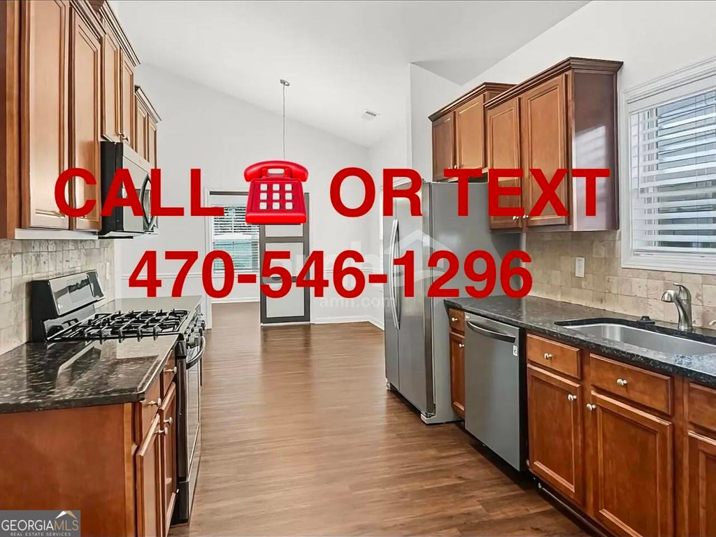 Photo of 3254 Hideaway Lane, Loganville, GA 30052 (MLS # 10812868)