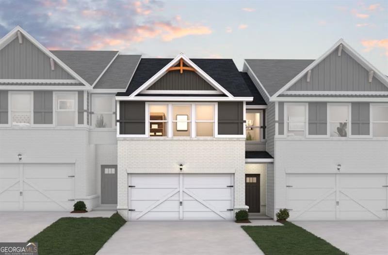 Welcome to the Morgan, a thoughtfully designed townhome that combines comfort and style. This home features a two-car garage and an open-concept layout where the living room flows seamlessly into the kitchen, creating the perfect space for entertaining or relaxing. A convenient half bath and a large patio complete the main floor. Upstairs, the laundry room is ideally located near all bedrooms for ease. Three secondary bedrooms share a full bathroom on one side, while the spacious primary suite offers a private retreat with a luxurious bathroom featuring a stand-alone tub, LED mirrors, and a large walk-in closet for ultimate convenience and comfort.