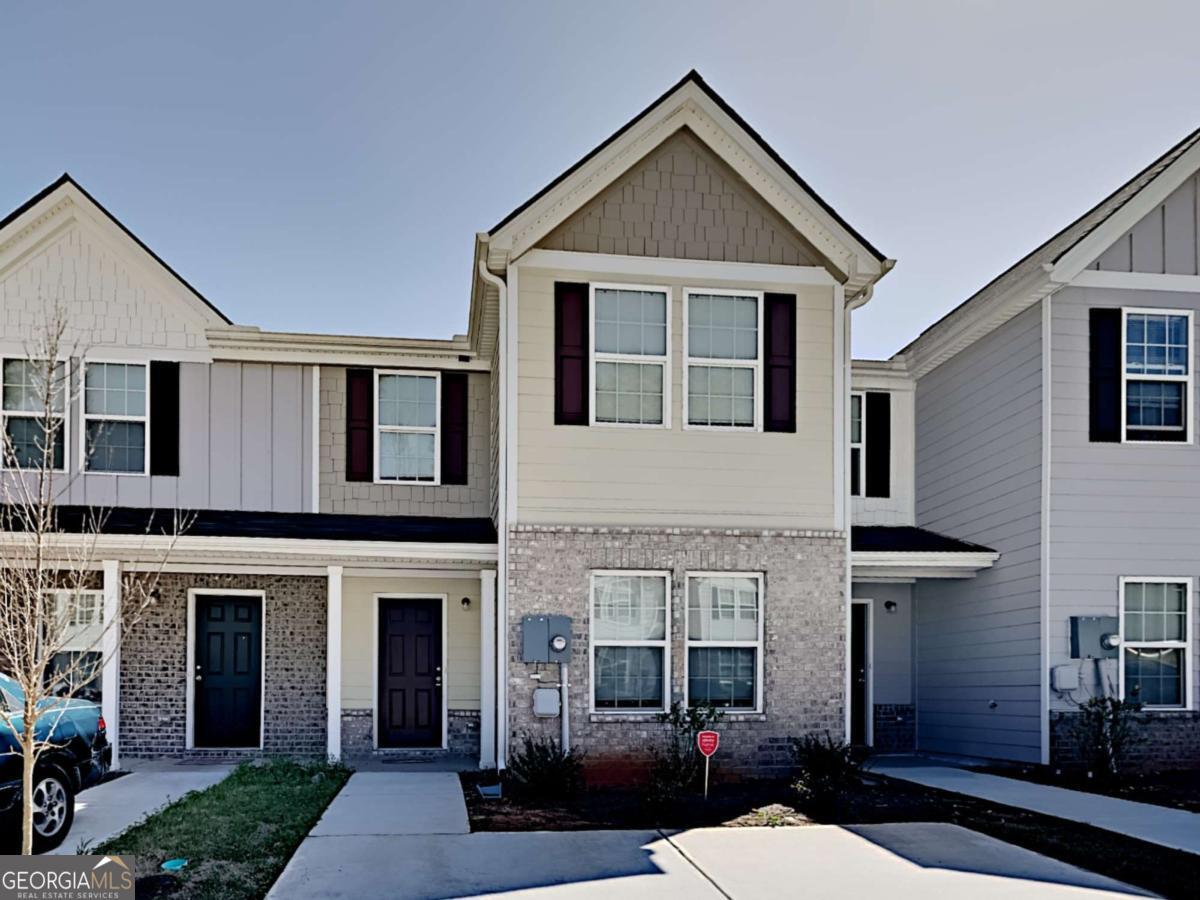 Incredible investment opportunity! This home features an open concept layout with a kitchen that overlooks the family room and includes a breakfast bar. The main level offers a storage closet for convenience. Upstairs, the owner's suite includes a spacious bedroom, walk-in closet, and double vanity. Close to Stonecrest mall and I-20.