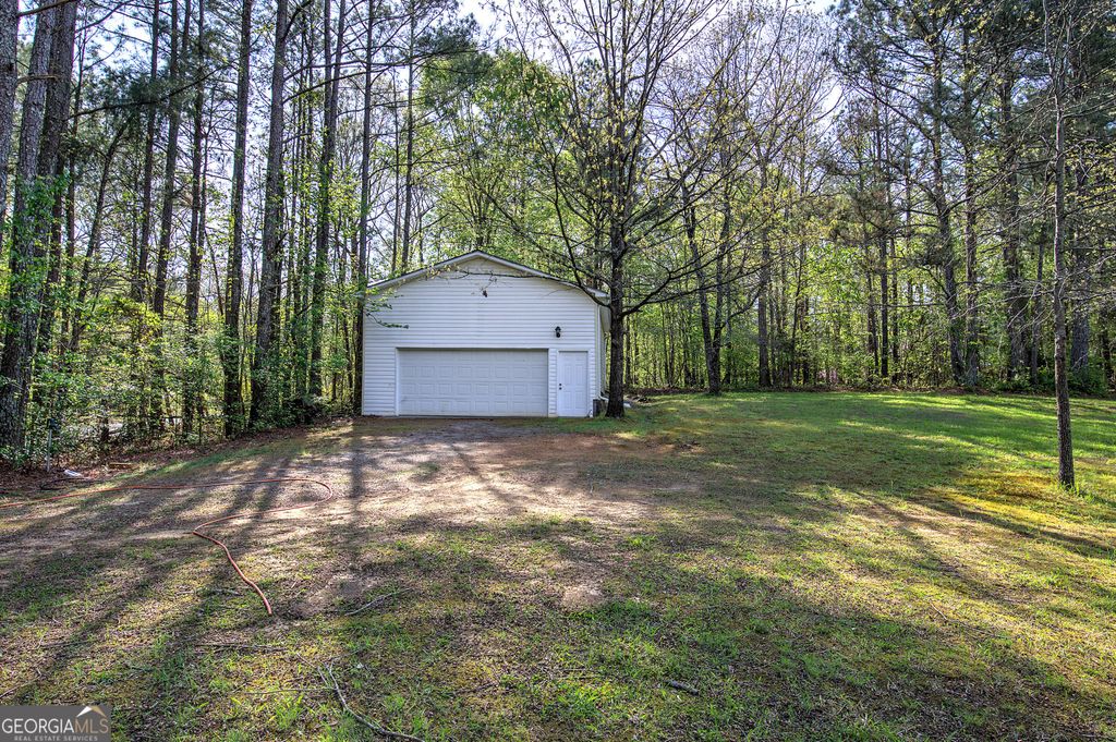 Photo of 309 Russell Hill Estates Drive NW, Sugar Valley, GA 30746 (MLS # 10730313)