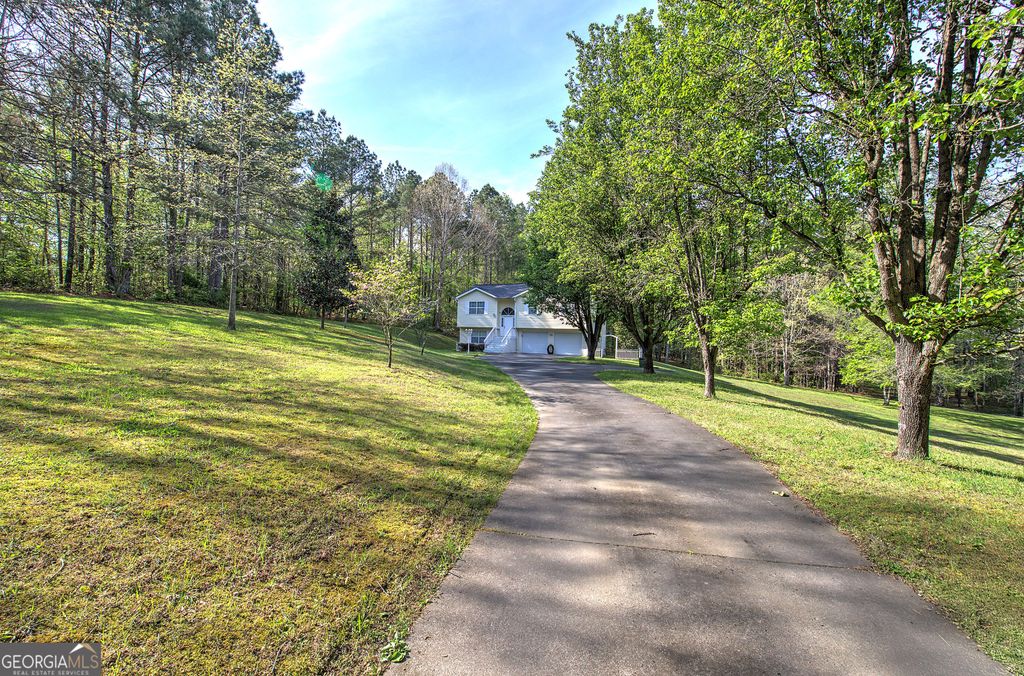 Photo of 309 Russell Hill Estates Drive NW, Sugar Valley, GA 30746 (MLS # 10730313)