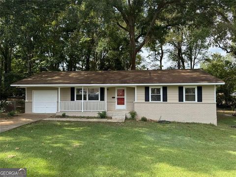 Photo of 8845 ASHWOOD Dr, Riverdale, GA 30274 (MLS # 10624253)