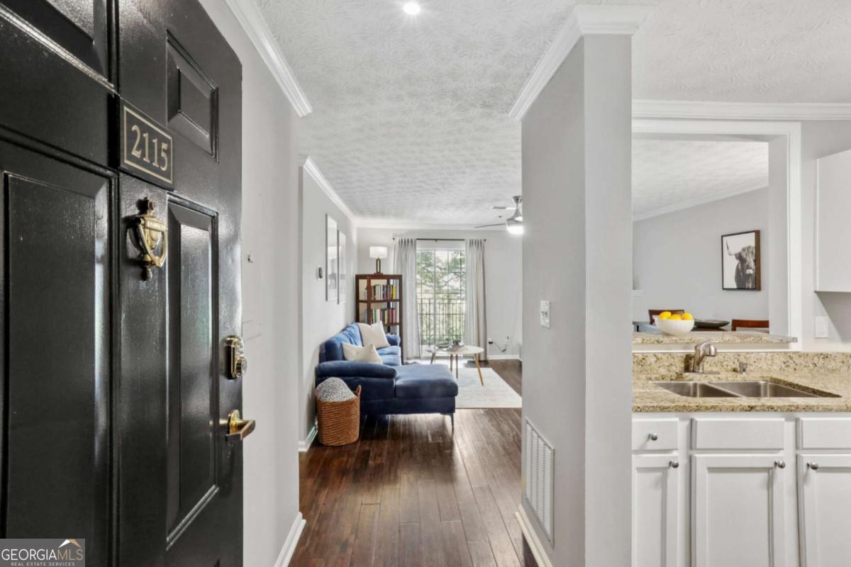 Fabulous Luxury Condo in the Heart of Buckhead! Live your best life in one of Atlanta's most sought-after neighborhoods! This stylish 1-bedroom, 1-bath retreat puts you just steps from world-class shopping, acclaimed dining, and Buckhead's vibrant nightlife-plus quick, easy access to I-85, I-75, and GA-400 for effortless commuting. Inside, you'll find an open, light-filled layout with gleaming hardwood floors, a spacious bedroom with a huge walk-in closet, and a granite kitchen with a walk-in pantry-and nearly all appliances replaced this year. The spa-inspired bathroom offers a deep soaking tub and shower, while the side-by-side laundry (washer & dryer included) makes life a breeze. Recent upgrades include fresh paint, modern light fixtures, and a Nest thermostat. Tucked away from busy streets, this peaceful unit is perfect for remote work, study, or simply relaxing in style. The gated community boasts incredible amenities: Deeded parking in a secured garage, Sparkling pool with sunny lounging deck & grilling area, Two fitness centers, Pet walk & green space, Google Fiber internet All just minutes from Lenox Mall, Phipps Plaza, Peachtree Battle, Emory, CDC, Georgia Tech, and more! Move-in ready. Luxury living. Unbeatable location.