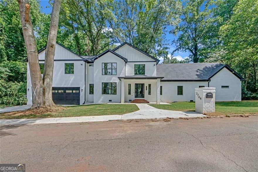 Step into a one-of-a-kind residence where modern design meets everyday comfort. This elegant 6-bedroom, 5.5 bath home is filled with high-end finishes, smart home upgrades, designer wood flooring, and sleek LED ceiling accents throughout.  The chef's kitchen is a true showstopper, featuring two oversized islands and quartz countertops  ideal for both daily living and entertaining. The main-level primary suite offers a spa-like escape with a soaking tub, glass walk-in shower, dual vanities, walk-in closet, and a private electric fireplace. A guest suite with a full bath is also located on the main floor.  Upstairs, enjoy a stylish loft, LED-lit staircase, and four additional bedrooms  two with private en-suites and two connected by a Jack-and-Jill bath.  The home also boasts an amazing 3 car garage that feels like a ballroom oversized, pristine, and perfect for car lovers, a workshop, or flexible use.  Step outside to a spacious back porch, ideal for outdoor dining, entertaining, or simply relaxing under the open sky.  Additional features include laundry rooms on both levels and smart toilets throughout.  Schedule your private showing today  this dream home is one you don't want to miss!