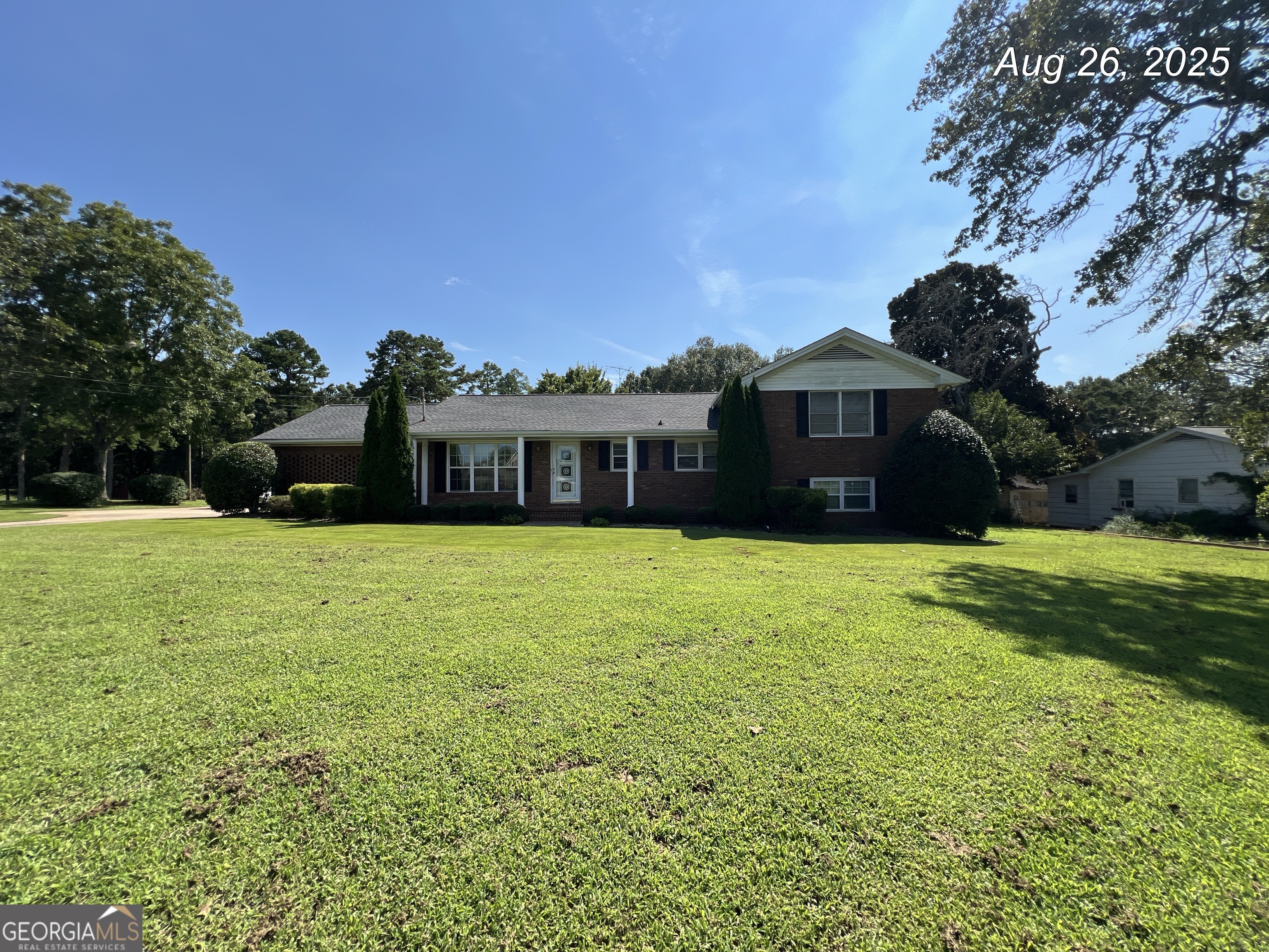 CONVENIENT TO ATHENS, WINDER, JEFFERSON AND HIGHWAY 316*** 3 bedrooms and 3 full baths***Primary bedroom on the main floor and is spacious with room for a separate den area***2 family room areas***Separate sunroom area***2 Additional bedrooms and 1 full bath on second level***Finished lower level perfect for teen suite, recreational room or bonus area***