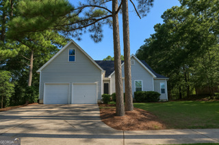 This charming home offers the perfect blend of comfort, space, and convenience. Step inside to find a bright layout that's ideal for both everyday living and entertaining. The inviting living room flows effortlessly into the kitchen and dining area, creating a warm and functional space for family and friends to gather. The kitchen features plenty of cabinetry and counter space, making meal prep a breeze. Bedrooms are generously sized, offering flexibility for a growing family, home office, or guest space. The primary suite provides a relaxing retreat with its own private bath. Enjoy peaceful mornings or host summer barbecues on the spacious back deck overlooking a private fenced in yard. Whether you're looking for a spot to garden, play, or simply relax, the outdoor space is a highlight you'll love year-round. Seller has installed a new roof, new paint throughout, as well has new garage doors. Located just minutes from downtown Villa Rica, schools, shopping, dining, and I-20, this home gives you easy access to everything while still offering the quiet charm of suburban living. Don't miss your chance to make this lovely Villa Rica home your own!