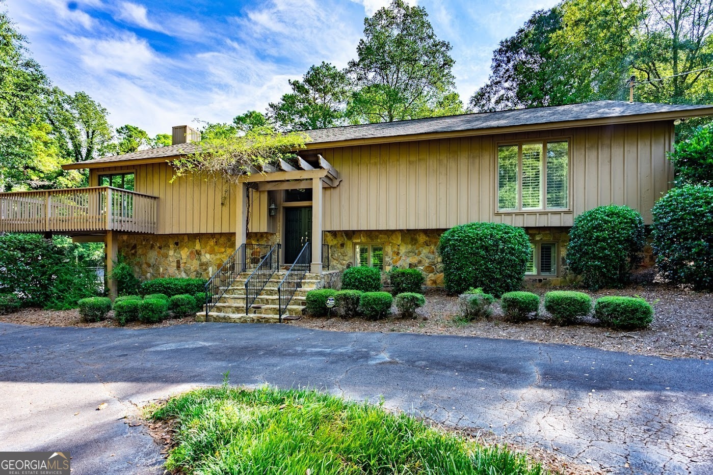 VERY DESIRABLE AREA ONE MILE FROM DOWNTOWN LAGRANGE AND LAFAYETTE SQUARE! FIVE MINUTES FROM GRANGER PARK TENNIS COMPLEX FEATURING BOTH CLAY AND HARD SURFACE COURTS, WALKING TRACK, WALKING TRAIL AROUND THE CITY KNOWN AS THE THREAD, BASEBALL FIELDS, AND BASKETBALL COURT, LAGRANGE HIGH SCHOOL, AND EMORY OF LAGRANGE. HILL TOP CONTEMPORARY SPLIT-LEVEL STONE AND CEDAR HOME WITH 3300 SQUARE FEET. TOP LEVEL FEATURES LIVING ROOM AND DINING ROOM AREA WITH SLIDING GLASS DOORS WITH ACCESS TO DECK FOR HILL TOP VIEW. HARDWOOD FLOORS, VAULTED CEILING, FIREPLACE, LARGE BOOKCASE WITH REMOVABLE SHELVES FOR ART OR CABLE READY TELEVISION. ENORMOUS 30'X14' KITCHEN WITH BREAKFAST ROOM, WHITE CABINETS, PANTRY, OAK BUTCHER BLOCK ISLAND, TWO WALL WHIRLPOOL ELECTRIC OVENS, HOODED VENT AND HEAT LAMPS, ELECTRIC COOKTOP UNIT, ONE WARMING OVEN, DISHWASHER, REFRIGERATOR-FREEZER, PORCELAIN FLOORS. SLIDING GLASS DOOR OPENS TO DECK. LARGE MASTER SUITE WITH SITTING AREA, BUILT IN BOOKSHELVES, CROWN MOLDING, HARDWOOD FLOORS, PLANTATION SHUTTERS, AND BLACK-OUT CURTAINS. MASTER BATH WITH DOUBLE VANITY, SHOWER, BATHTUB, AND LINEN CLOSET. TWO 8' WALK IN CLOSETS. GUEST HALF BATH AND 8' HALL CLOSET LOCATED ON TOP LEVEL. FRONT DOOR FOYER ENTRANCE HAS FIVE STEPS GOING UP, DOUBLE STAIR RAILINGS, ALARM SYSTEM, AND COAT CLOSET. SIX STEPS LEADING TO BOTTOM LEVEL FROM FRONT DOOR FOYER ENTRANCE. NEWLY CARPETED STONE STEPS. BOTTOM LEVEL GREAT FOR EITHER TEENAGE OR IN-LAW SUITE. 3 BEDROOMS WITH PLANTATION SHUTTERS. JACK AND JILL FULL BATHROOM. UTILITY ROOM WITH CLOSET, SILESTONE SINK, SPACE FOR WASHER AND DRYER, COMMODE, STAINLESS REFRIGERATOR-FREEZER, PLANTATION SHUTTERS, A/C UNIT. ONE BEDROOM/OFFICE HAS METAL DOOR FOR SEPARATE ENTRANCE TO 63' HISTORICAL BRICK PATIO, GRANITE SINK ON CEDAR STORAGE UNIT, AND ENCLOSED GARBAGE UNIT. 600 SQUARE FEET DOUBLE GARAGE WITH 10' OPENINGS, AUTOMATIC GARAGE DOORS WITH 2 HAND-HELD REMOTES AND 2 WALL MOUNTED REMOTES. LED FLOOD LIGHTS ON ROOF AND ON ALL POSTS ON PATIO. GARDEN LIGHTS. COMPLETELY FENCED BACKYARD. METAL DOOR ENTRY FROM GARAGE TO BOTTOM LEVEL HALLWAY.