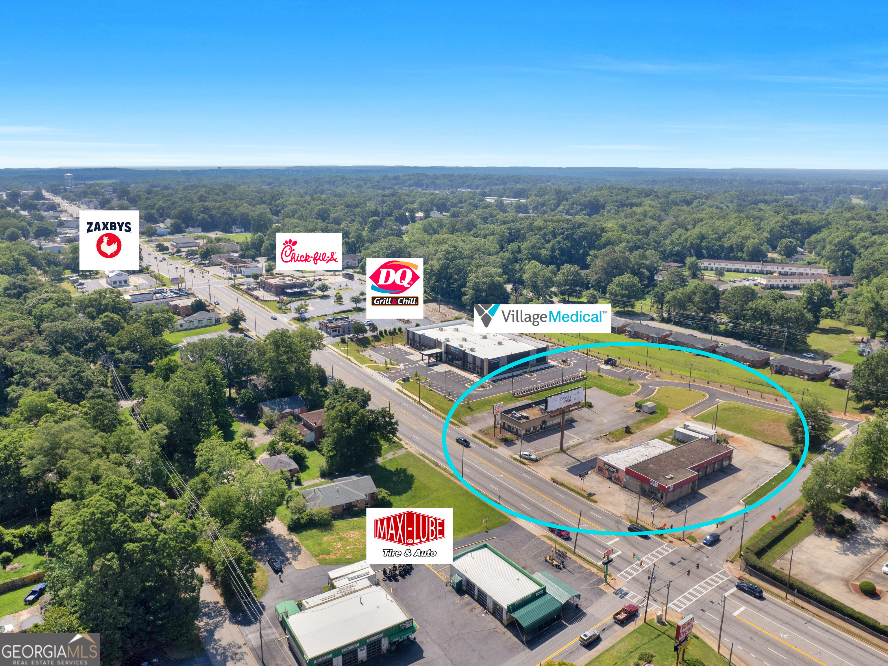 PRIME COMMERCIAL OPPORTUNITY FEATURING CORNER LOT WITH 1.389 ACRES, HIGH VISIBILTY, HIGH TRAFFIC AREA IN GRIFFN GA. Seize this exceptional investment opportunity with 280 feet of prime road frontage on W Taylor St. Located beside the new Village Medical Center and area of thriving businesses such as Dairy Queen, Chic-Fil-A, Zaxby's, Food Depot, Sonic Burger, La Parrilla Mexican and much more. All utilities are available with easement driveway across the back of the property for easy access off S 18th St. This property includes 2 buildings known as Margo's Restaurant and H&A Tire. Mobile Cell. Rented month to month. Excellent corner Lot with red light. Supports a wide range of Commercial or Office Usage. Zoned PCD. Don't miss your chance to secure this prime location in the fast-growing area of Griffin. Close proximity to I-75.