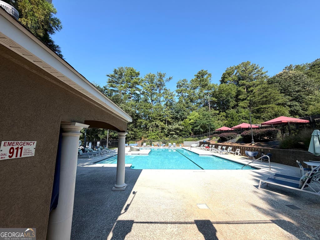 Photo of 795 Hammond Drive #APT 311, Atlanta, GA 30328 (MLS # 10817049)