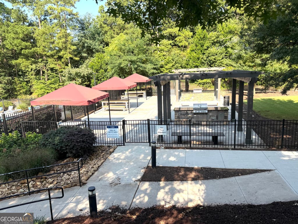 Photo of 795 Hammond Drive #APT 311, Atlanta, GA 30328 (MLS # 10817049)