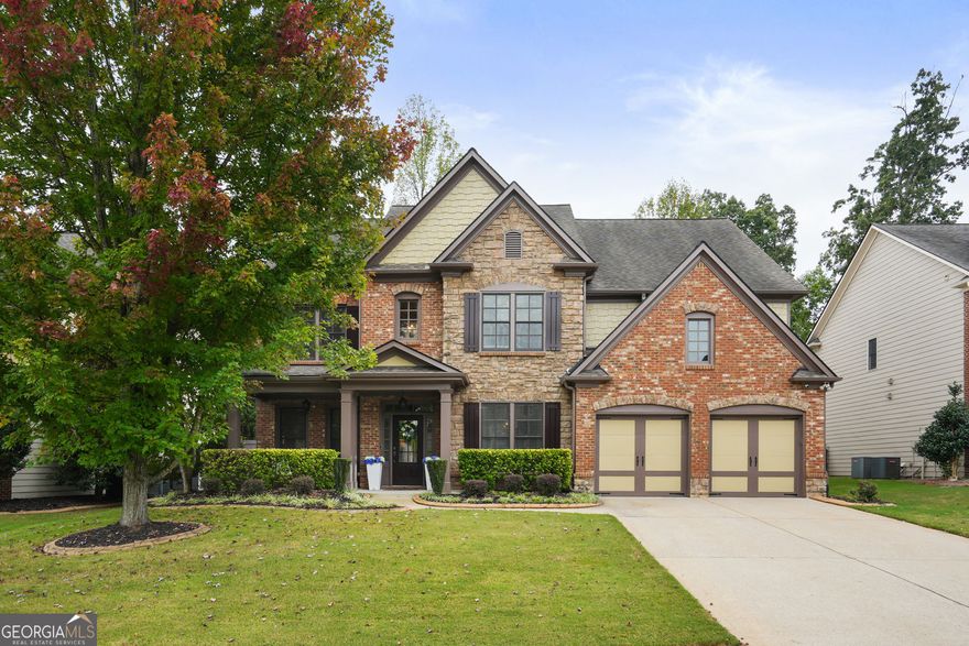 Step into this magazine-worthy home in sought after Alpharetta location and experience the treat of a meticulously maintained space filled with natural light, high end finishes, and hand scraped hardwoods on main. As you enter into the two story foyer you'll quickly notice the brilliance of this floor plan and the impressive ambiance the home delivers to each guest. The main floor provides the perfect living space, formal dining, office and more. The gorgeous kitchen houses an oversized island and flows into a spacious eat-in area and cozy keeping room complete with a stacked-stone fireplace and beautiful built-ins.   Upstairs, the luxurious primary suite includes trey ceiling, spa like bath with separate tub and shower, dual vanity, and a large walk-in closet. Generous space and closets in each secondary bedroom. You will find laundry conveniently located upstair as well. To top if off enjoy the oversized bonus room for whatever you'd like or turn it into a 5th bedroom by adding a closet.   Step outside to the private fenced oasis-grill in your custom outdoor kitchen, relax by the fire pit, dine al fresco, or create a peaceful moment. Enjoy ALL your outdoor moments as HOA covers lawn care, plus offers swim and tennis!  This prime location with quick access to highway, shopping, dining, and entertainment. A must-see!