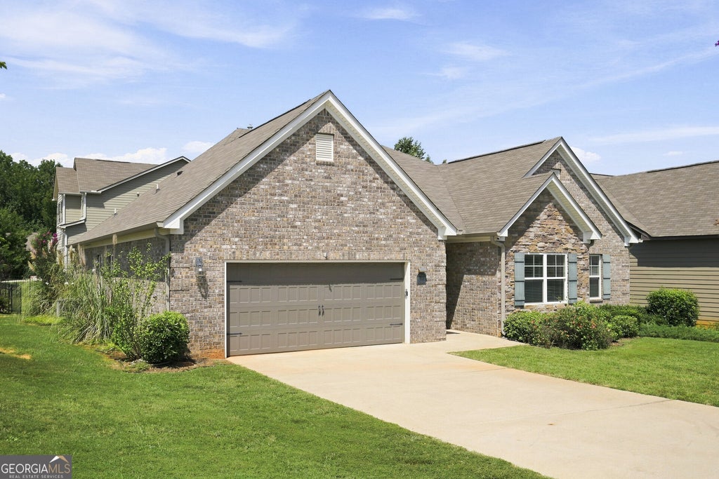 Photo of 319 San Anselmo Street, Locust Grove, GA 30248 (MLS # 10874634)