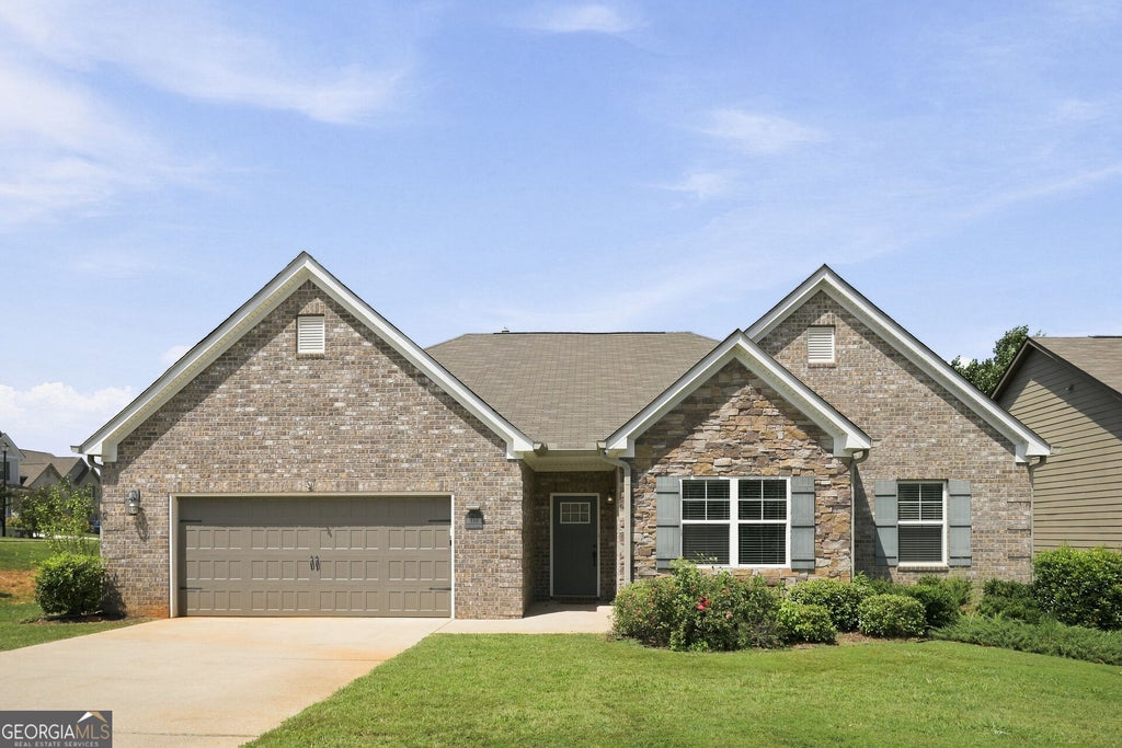 Photo of 319 San Anselmo Street, Locust Grove, GA 30248 (MLS # 10874634)