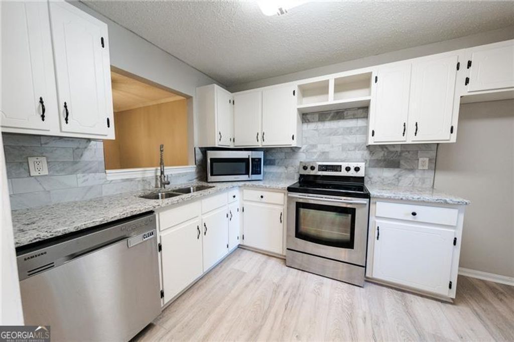 Photo of 4089 Stillwater Drive, Duluth, GA 30096 (MLS # 10735896)