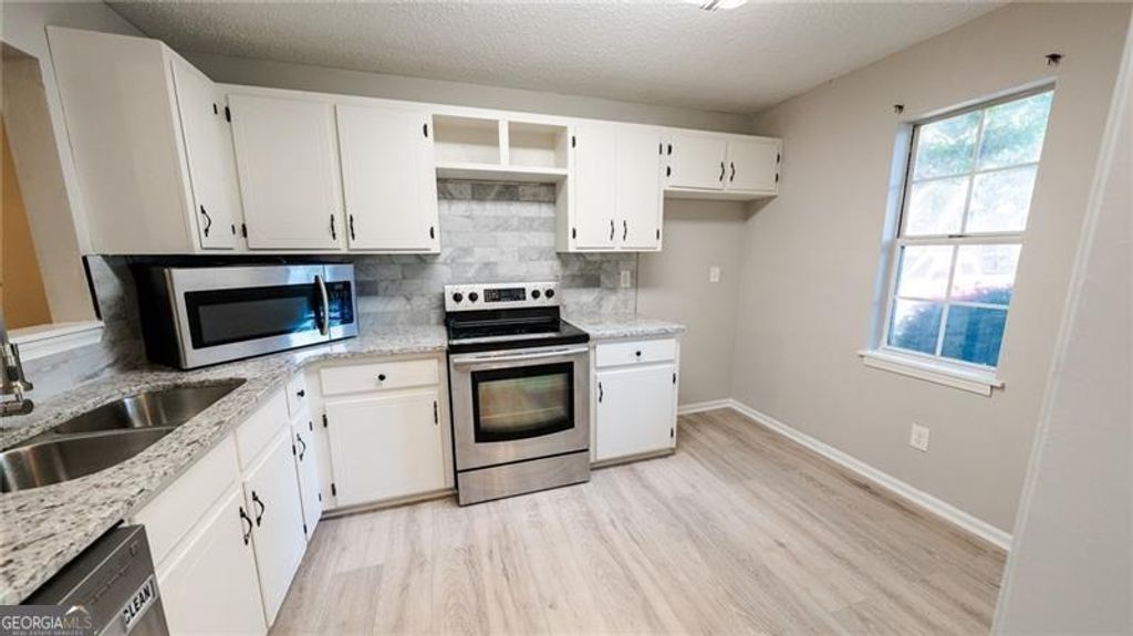 Photo of 4089 Stillwater Drive, Duluth, GA 30096 (MLS # 10735896)