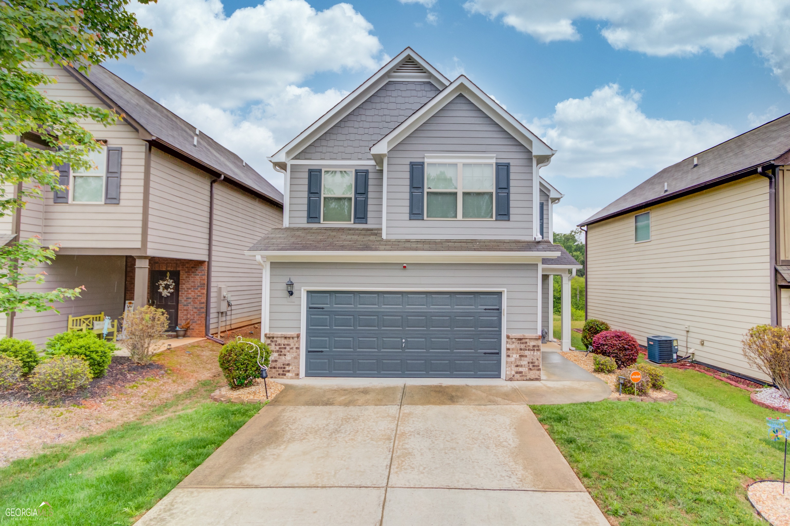 Welcome to this stunning 4 bedroom, 2.5 bath home located in the highly sought-after Lawrenceville area serving Dacula Schools, offering convenient access to major highways for easy commuting. This home boasts a recently painted exterior and has been immaculately maintained, showcasing pride of ownership. As you step inside, you'll be greeted by a spacious and inviting interior that features all bedrooms upstairs for added privacy. The main level boasts a bright and airy living room, perfect for entertaining guests and spending quality time with loved ones. The kitchen is a chef's dream, with ample countertop space, modern appliances, and plenty of storage for all your cooking essentials. Upstairs, you'll find four generously sized bedrooms, including a master suite that is sure to impress. The master suite features a walk-in closet and an en-suite bath, complete with a soaking tub, separate shower, and dual sinks. In addition to the recent exterior paint job, this home's fence has just been updated with brand new wood that has been treated to prevent rotting, termites, mold, and water damage. You'll appreciate the recent updates to the fence and the newly painted wooden planks, which add to the home's charm and character. You'll love the convenience of the location, which is just minutes from major highways, shopping, dining, and entertainment options. Don't miss out on this incredible opportunity to own a beautifully maintained home in a desirable location! Schedule your showing today.
