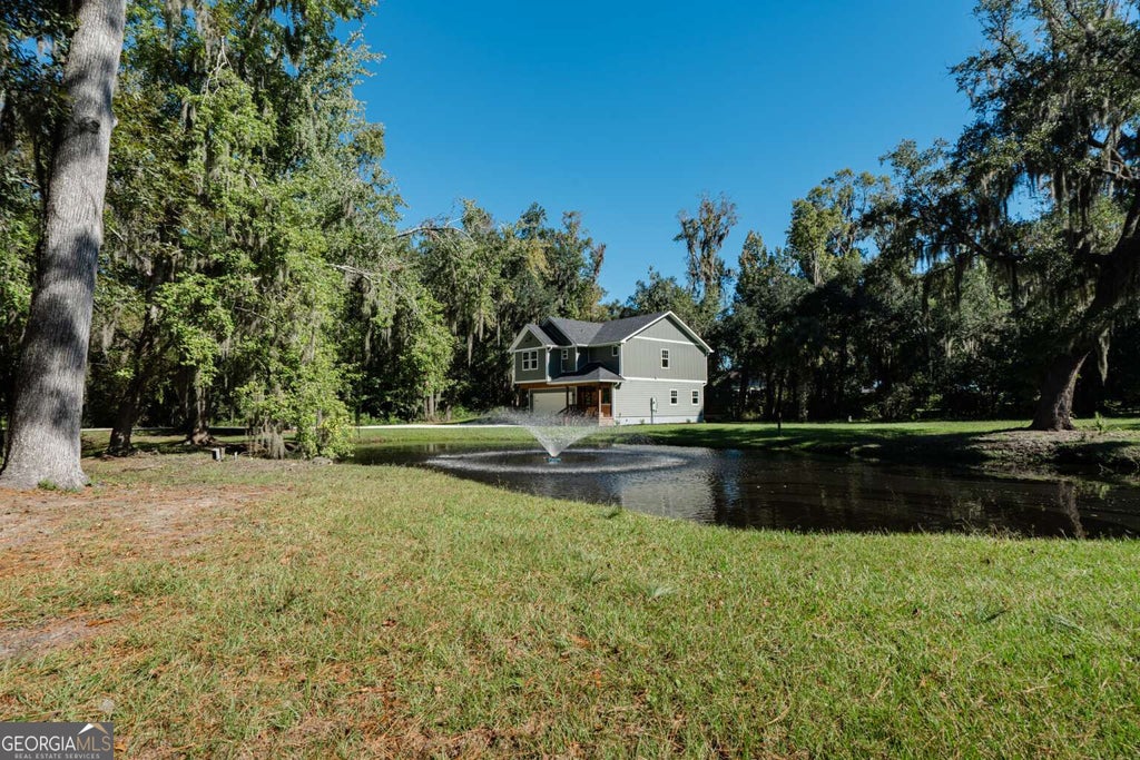 Photo of 91 Sir Edward Teach Road, Midway, GA 31320 (MLS # 10880127)