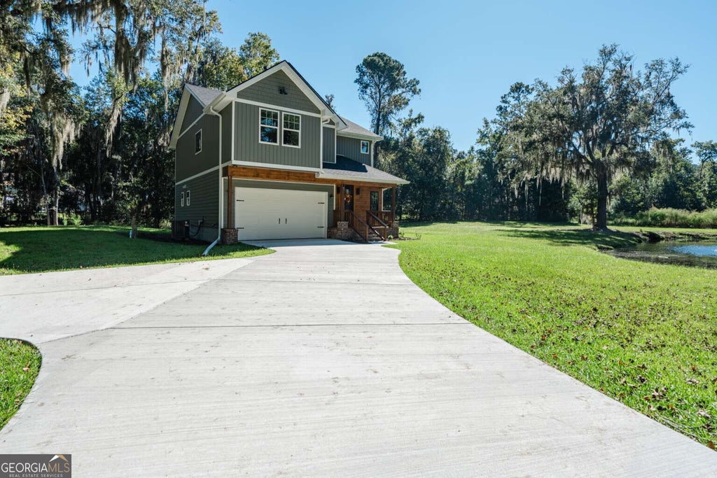 Photo of 91 Sir Edward Teach Road, Midway, GA 31320 (MLS # 10880127)